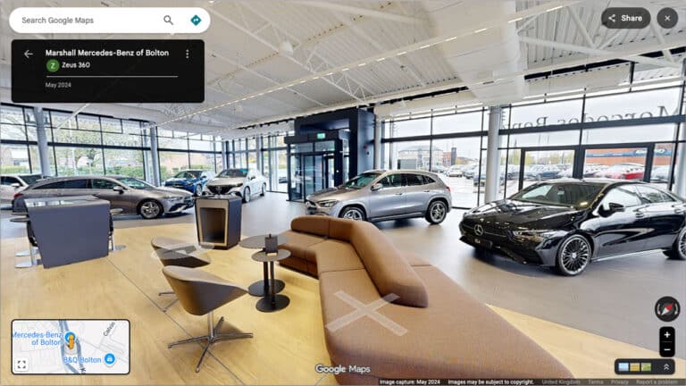 A 360-degree virtual tour inside a luxury car dealership showroom for Google Maps integration.